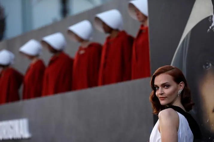 Cast member Madeline Brewer poses at the premiere for the second season of the television series \"The Handmaid\\'s Tale\" in Los Angeles, California, U.S., April19, 2018. REUTERS/Mario Anzuoni , Reuters Images/Mario Anzuoni