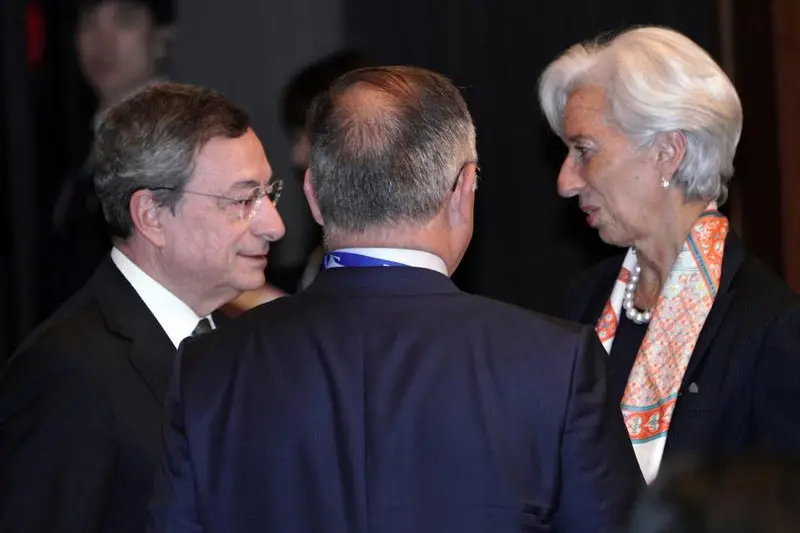 International Monetary Fund (IMF) Managing Director Christine Lagarde and European Central Bank (ECB) President Mario Draghi speak prior to the G20 finance ministers and central bank governors meeting, in Fukuoka, Japan June 8, 2019. Eugene Hoshiko/Pool via REUTERS