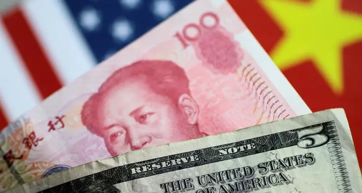 China's state banks step in to arrest yuan slide after mortgage rate cut - sources
