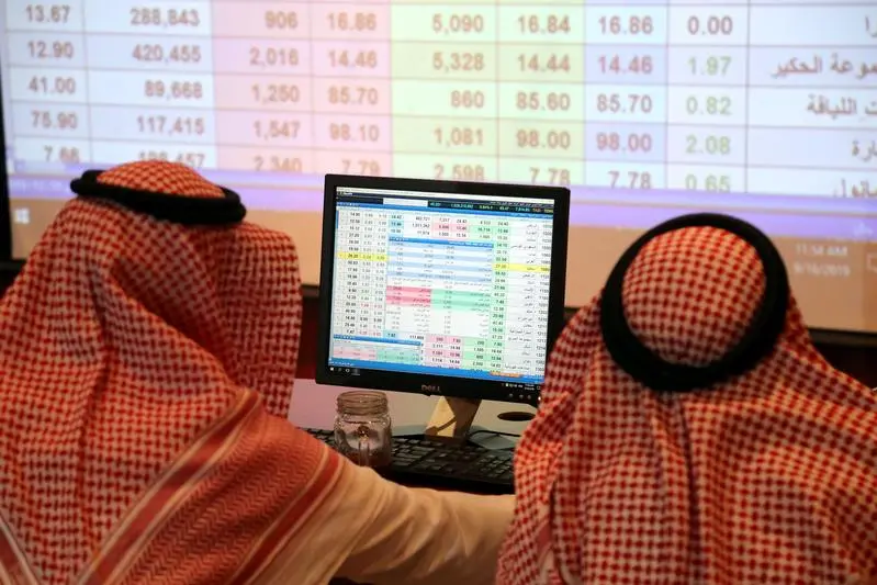 A Saudi man looks at the computer showing stock prices at ANB Bank in Riyadh, Saudi Arabia September 16, 2019. Reuters, Ahmed Yosri , Reuters