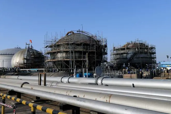 Workers are seen at the damaged site of Saudi Aramco oil facility in Abqaiq, Saudi Arabia, September 20, 2019.  , Reuters Images/Hamad l Mohammed