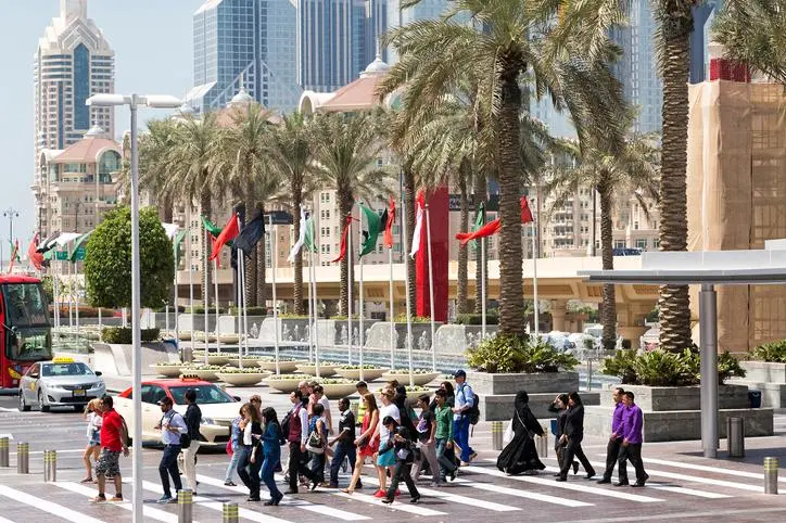 Image used for illustrative purpose.\\r\\nCommuters Crossing Busy Street in Dubai UAE. , Gecko Media