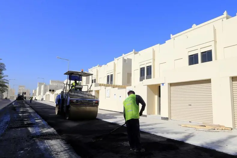 Workers are seen at a construction side in one of the government housing projects in Budaiya, west of Manama, December 23, 2013.\\r\\n  , Reuters Images/Hamad I Mohammed 