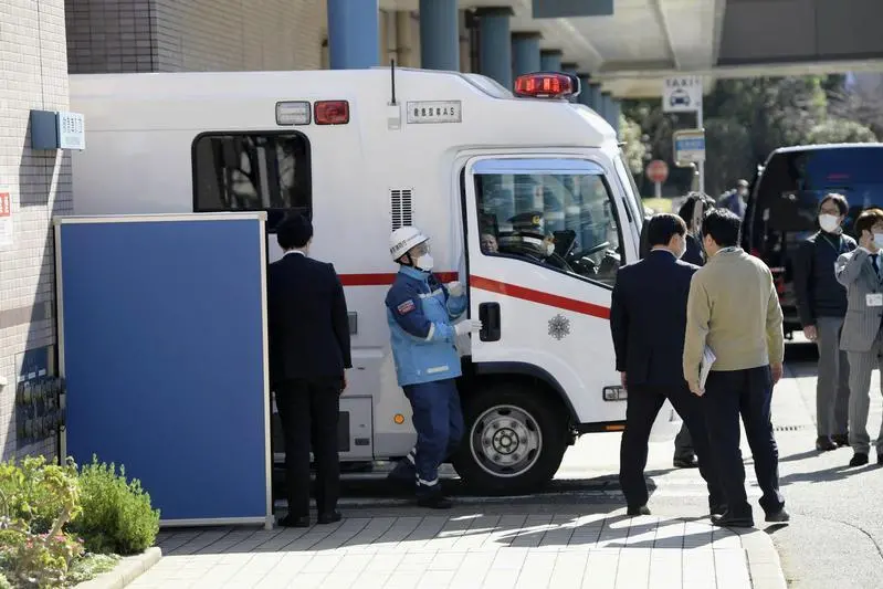 An ambulance carrying a Japanese national who evacuated from Wuhan by a chartered plane, arrives at a hospital in Tokyo, Japan in this photo taken by Kyodo January 30, 2020. Mandatory credit Kyodo/via REUTERS.