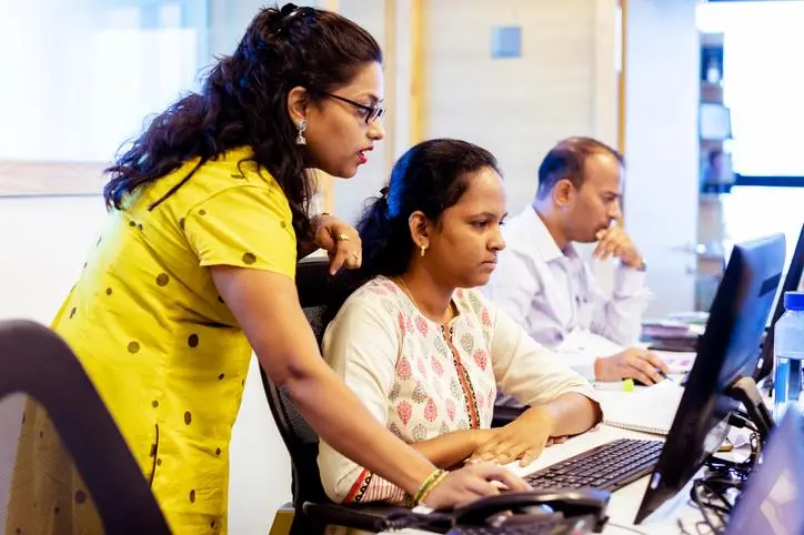 Female Office Manager Training New Staff about their CRM System.\\r\\nImage used for illustrative purpose. , Getty Images