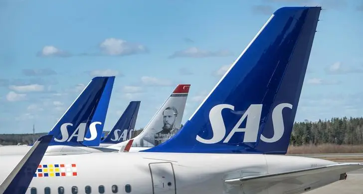 Airline SAS predicts busy summer as loss shrinks