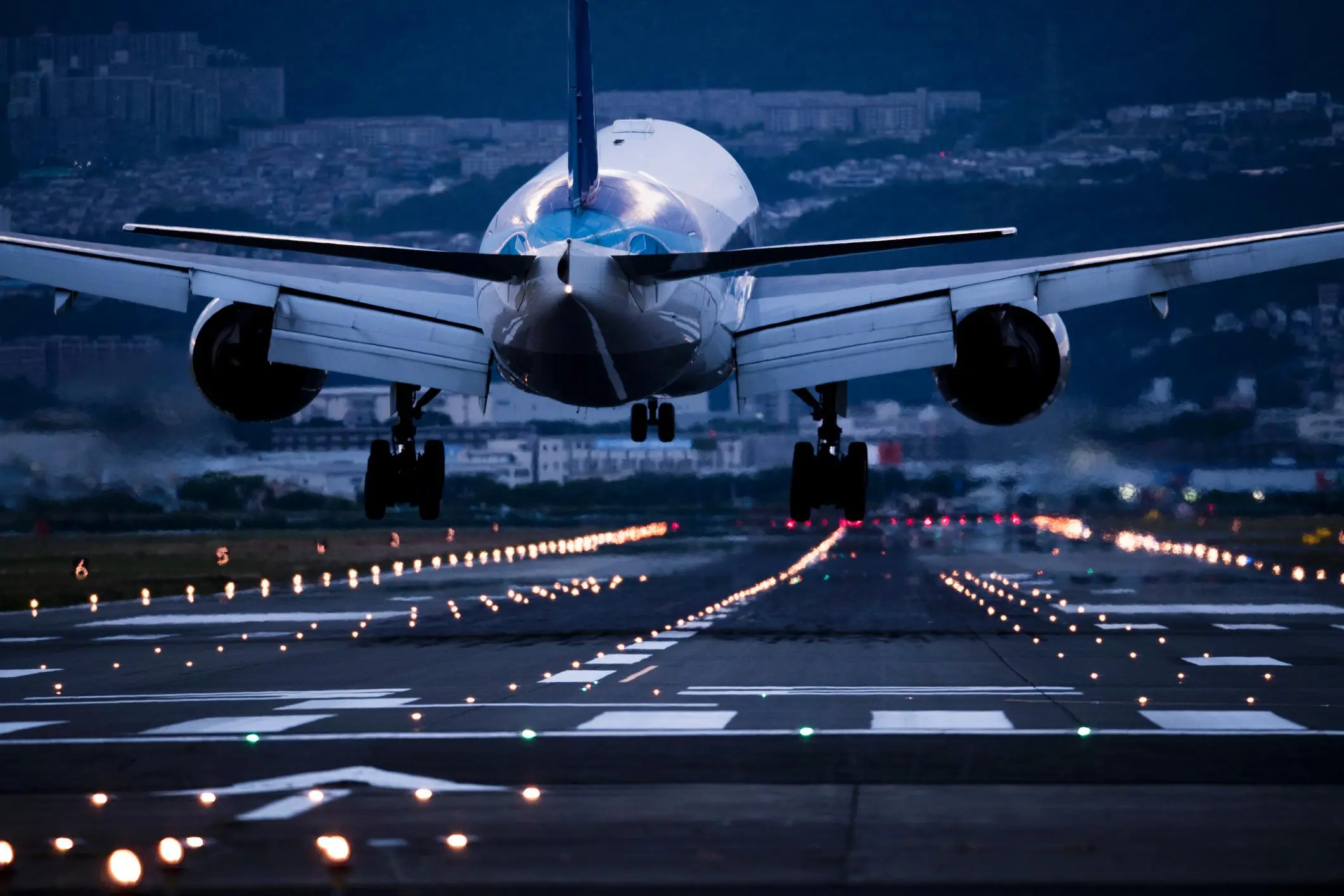 airplane taking off at night wallpaper