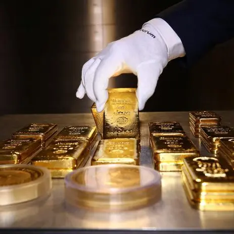 Gold holds steady as traders await US data for more Fed cues