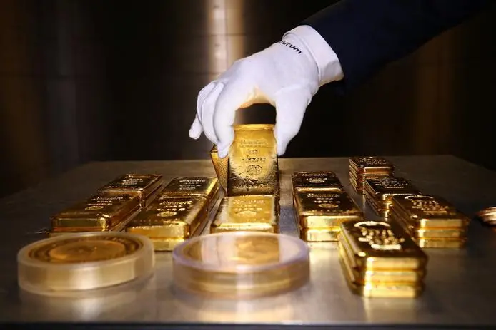 Gold holds steady as traders await US data for more Fed cues