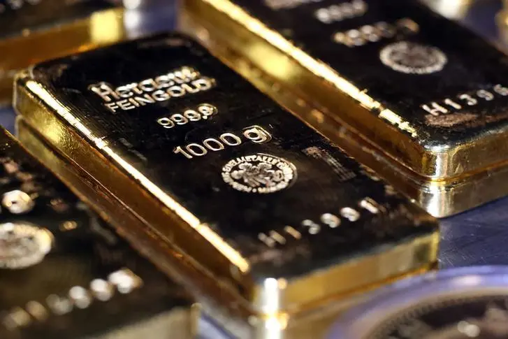 Gold resumes retreat despite soft jobs report as traders book profits