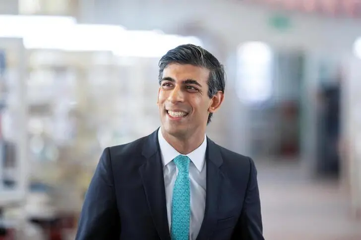 Britain\\'s Chancellor of the Exchequer Rishi Sunak smiles during a visit to the Emma Bridgewater pottery, amid the coronavirus disease (COVID-19) outbreak, in Stoke-on-Trent, Britain, September 14, 2020. Andrew Fox/Pool via REUTERS\\r\\n