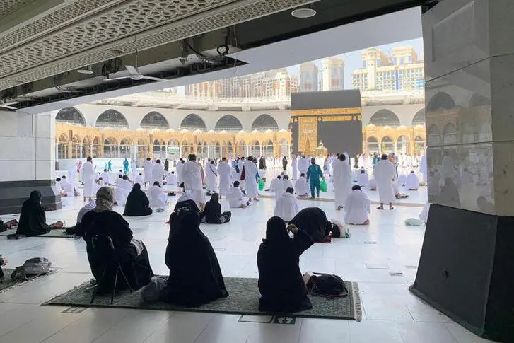Muslims, keeping a safe social distance, perform Umrah at the Grand Mosque after Saudi authorities ease coronavirus disease (COVID-19) restrictions, in the holy city of Mecca, Saudi Arabia, October 4, 2020. \\\\ , Reuters Images/Marwa Rashad