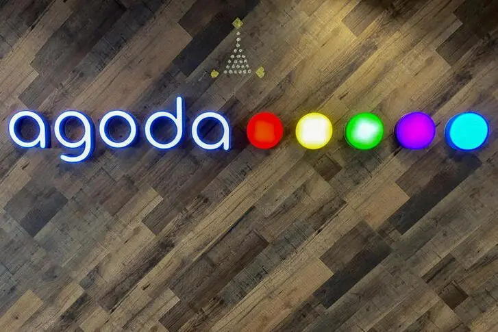 The logo of Agoda online travel agency is seen at their office in Bangkok, Thailand, October 5, 2020.  , Reuters Images/Chayut Setboonsarng