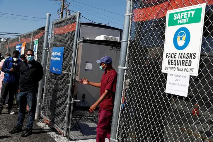 People wait in line to have swab samples taken for the coronavirus disease (COVID-19) at a testing center in the Far Rockaway section of the Queens borough of New York, U.S., October 6, 2020. , Reuters Images/Shannon Stapleton