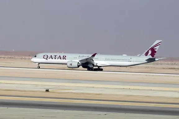 A Qatar Airways plane lands at the King Khalid International Airport, in Riyadh Saudi Arabia January 11, 2021.  , Reuters Images/Ahmed Yosri