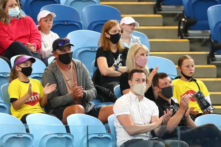 Tennis - Yarra Valley Classic - Melbourne Park, Melbourne, Australia, February 7, 2021 Fans watch the final singles match between Australia\\'s Ashleigh Barty and Spain\\'s Garbine Muguruza. Crowd capacity for this years event has been capped at 25% following the outbreak of the coronavirus disease (COVID-19). , Reuters Images/Kelly Defina