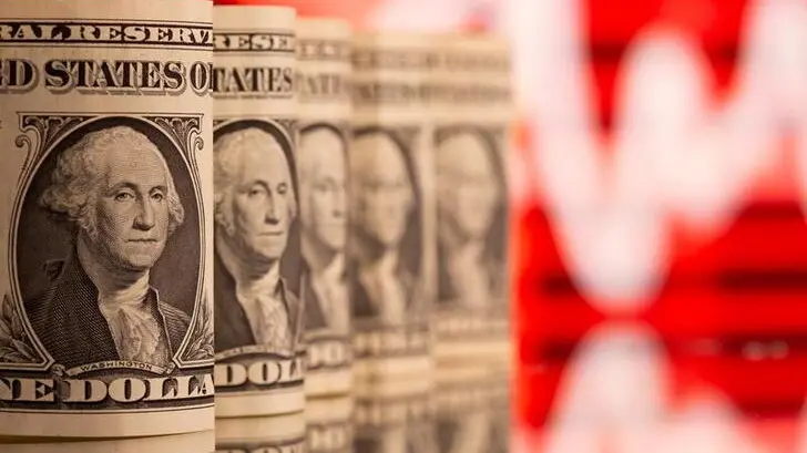 Dollar holds losses after Trump announces Japan trade deal