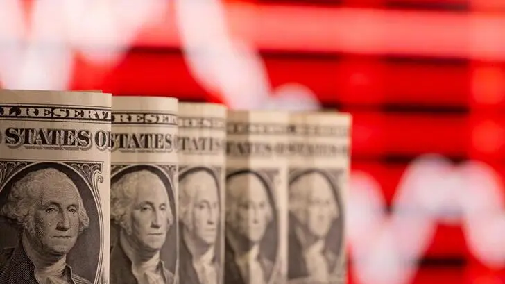 Dollar holds steady as investors wait for Fed guidance