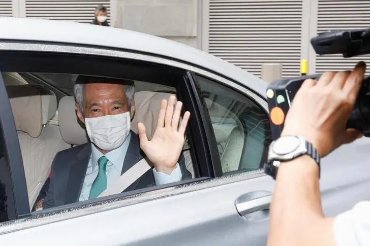 Singapore\\u2019s Prime Minister Lee Hsien Loong arrives at the High Court for a defamation hearing against blogger Leong Sze Hian in Singapore October 6, 2020. , Reuters Images/Edgar Su