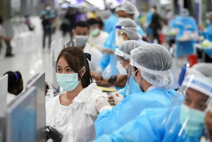 A person receives China\\'s Sinovac coronavirus disease (COVID-19) vaccine at the Central Vaccination Center, inside the Bang Sue Grand Station, in Bangkok, Thailand, May 24, 2021.  , Reuters Images/Athit Perawongmetha