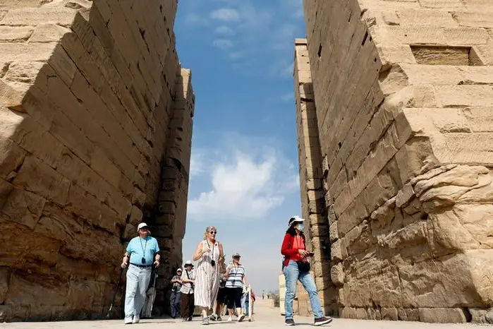 Tourists visit Karnak Temple, following an outbreak of coronavirus, in Luxor, Egypt March 9, 2020.Mohamed Abd El Ghany REUTERS