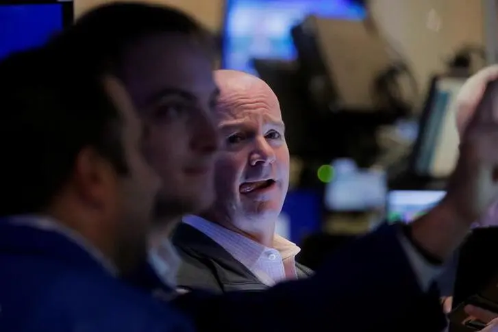 Traders work on the floor of the New York Stock Exchange (NYSE) in New York City, U.S., October 20, 2021.   , Reuters Images/Brendan McDermid
